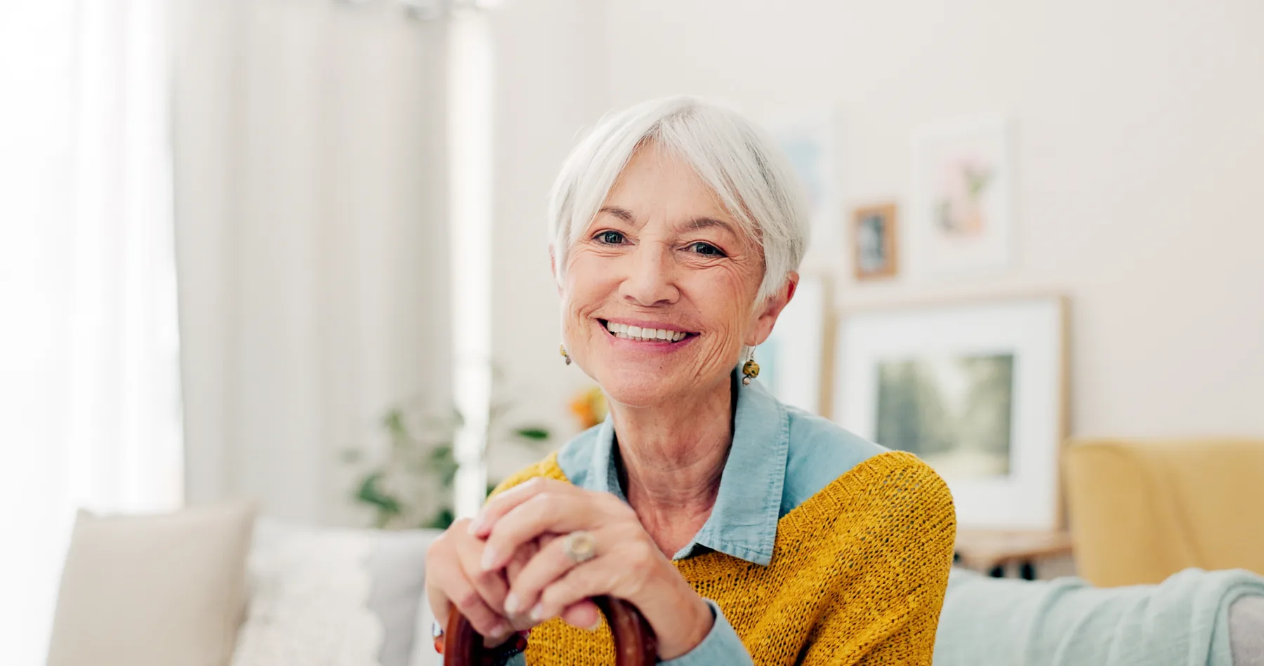 Smiling senior woman in a bright home